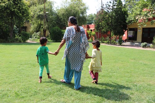 India_CV Faridabad_SOS mother walking with girls_RMiller-2.JPG